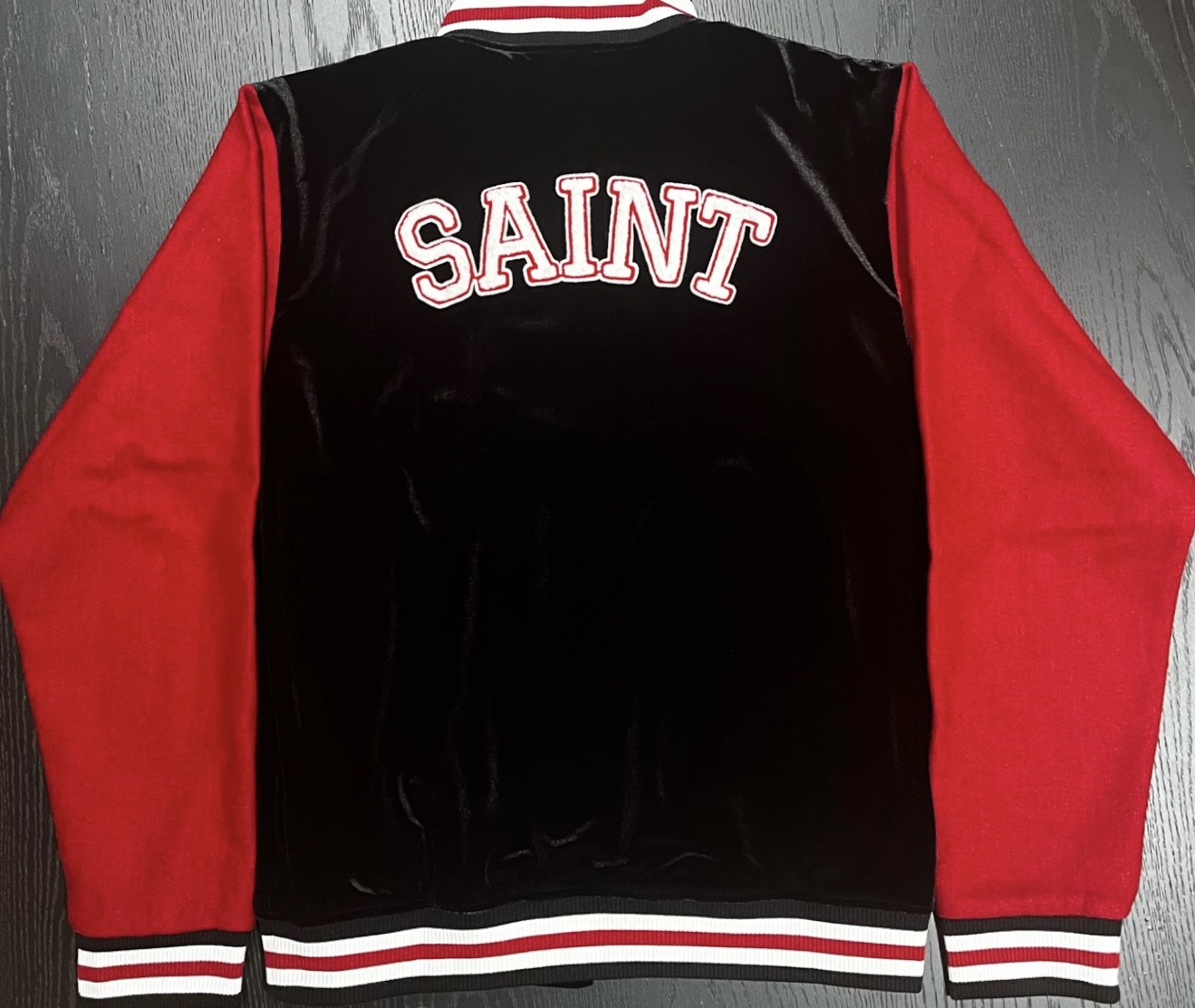 Saint Varsity Jacket by Saint Named Greatness